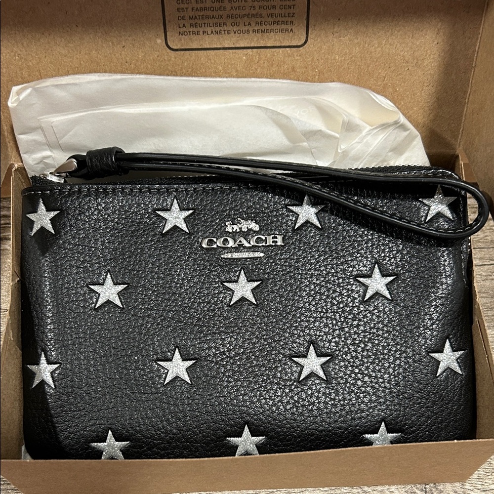 Coach Black Wristlet with Silver Star Embellishments